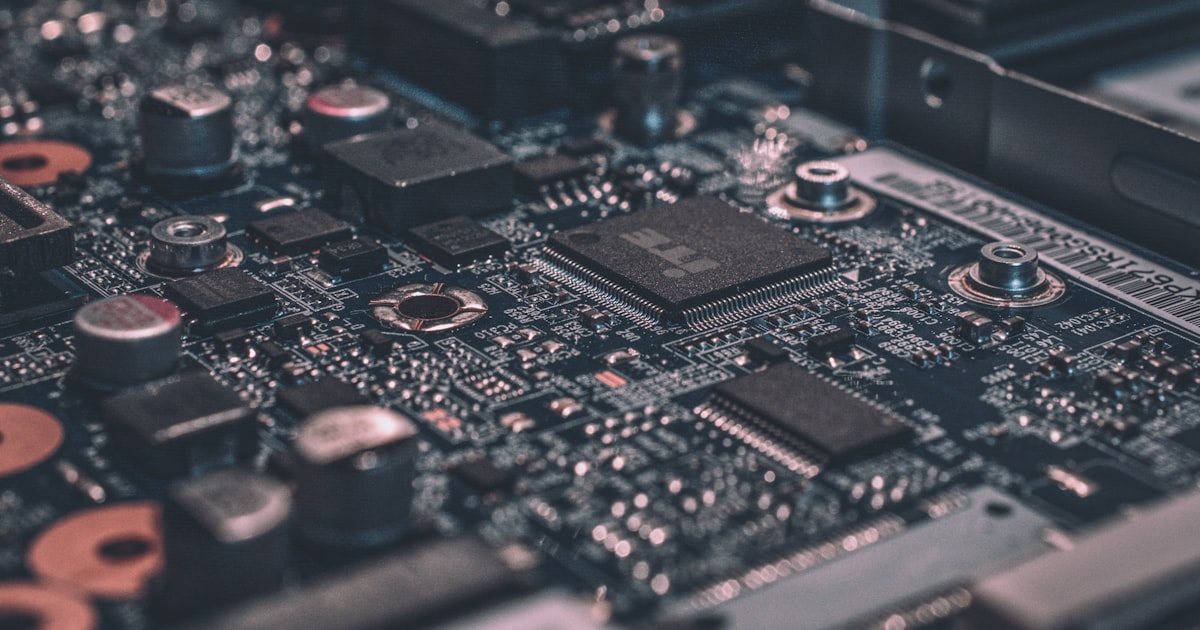 Circuit board closeup representing hardware-level inference optimization